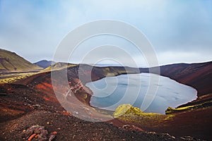 Iceland, Ljotipollur Lake in volcanic mountains of Landmannalaugar, beautiful scenic nature of highlands photo