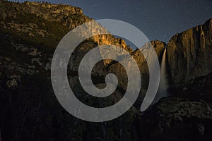 Moon light and star at Yosemite Upper Falls during a full moon in National Park, California, USA