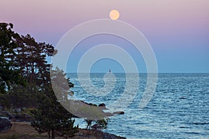 Moon and lighthouse