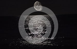 Moon on Mediterranean sea photo