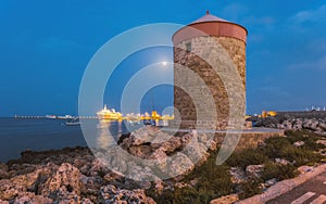 Moon with a mill in the tourist haven. Rhodes Island. Greece