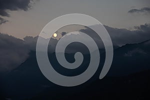 Moon mountains and night clouds