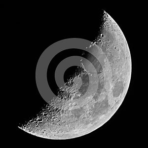 Moon on night sky over telescope