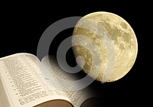 Moon and open bible