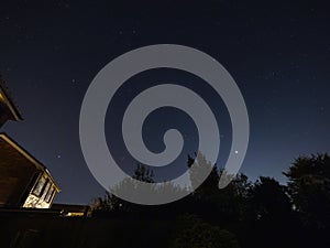 Moon, Orion, Sirius and Venus in Night Sky photo