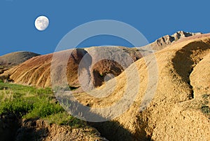 Moon over badlands