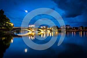 The moon over the John W Weeks Bridge and Charles River at night