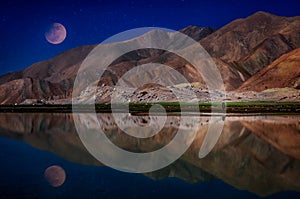 Moon over Kara Kul lake