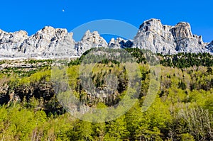 Moon over the mountain in Ordesa Valley, Aragon, Spain