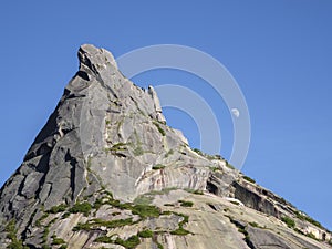 Moon over the sharp rock