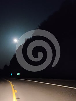That moon peeking through the night sky look at the wonderment