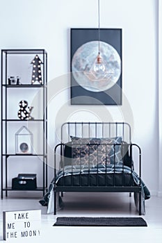 Moon poster in bedroom interior
