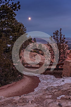 Moon Rises Over Snowy Path