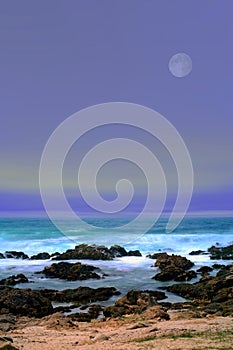 Moon setting Asilomar State Marine Reserve California