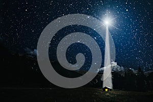 moon shines over the manger of christmas of Jesus Christ. photo