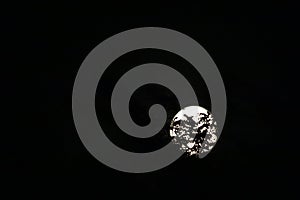 Moon visible through tree branches at night