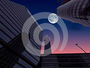 Moon in the sky above the buildings