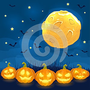 Moon on sky and halloween pumpkins on grass
