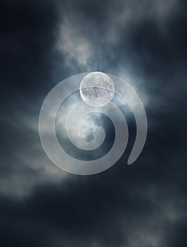 Moon in the stormy night sky