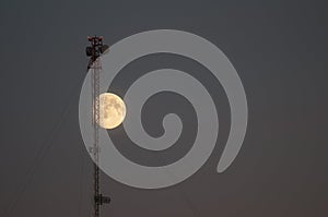 Moon and telecommunications tower