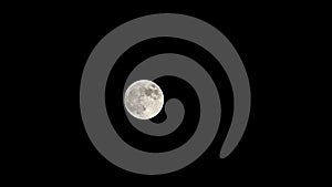 Moon time lapse, stock time lapse: full moon rise in dark nature sky, night time. Full moon disk time lapse with moon light up in