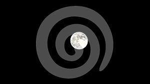 Moon time lapse, stock time lapse: full moon rise in dark nature sky, night time. Full moon disk time lapse with moon light up in