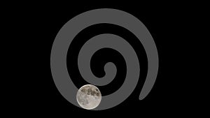 Moon time lapse, stock time lapse: full moon rise in dark nature sky, night time. Full moon disk time lapse with moon light up in