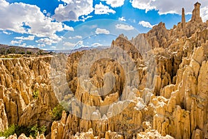 Moon Valley or Valle De La Luna eroded sandstone spikes panorama near La Paz, Bolivia