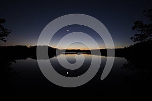 Moon and Venus over Paurotis Pond in the Everglades.