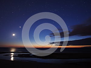 Moon Venus and stars on night sky