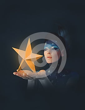 Moon woman holding stars in her hands