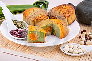 Mooncake for Chinese mid-autumn festival celebration, wih ingredients and tea.