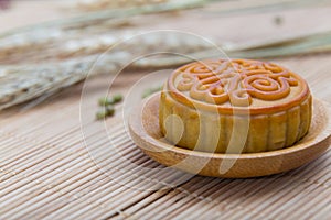 Mooncake, Chinese Midautumn festival dessert with copyspace photo