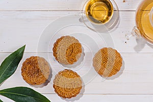 Mooncake and tea, Chinese mid autumn festival food. Angle view f