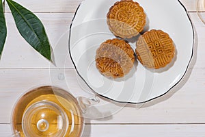 Mooncake and tea, Chinese mid autumn festival food. Angle view f