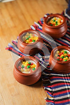 Moondi rabri milk kheer served in pot isolated on mat top view of indian, bangali and pakistani dessert mithai