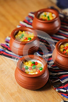 Moondi rabri milk kheer served in pot isolated on mat top view of indian, bangali and pakistani dessert mithai