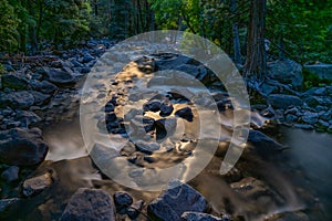 Moonlight dances over rocks and cascades Yosemite Creek, Yosemite Nat`l. Park, CA