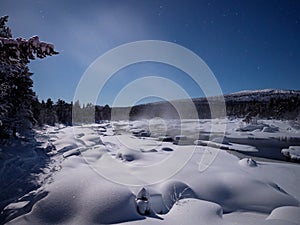 Moonlight over Juutuanjoki River in Finland