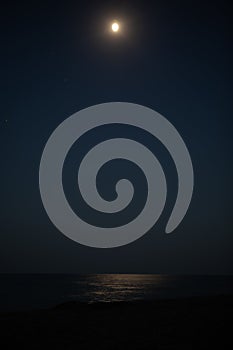 moonlight over sea.