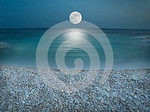 Moonlight on the pebble beach