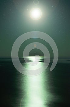 Moonlight by the sea photo