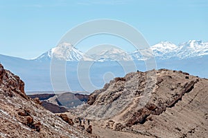 Moonlike landscape of dunes, rugged mountains and rock formations of Valle de la Luna Moon valley, Atacama desert, Chile