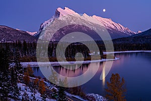 Moonlit sky over Mount Rundle with the Vermilion Lakes in the foreground in the Banff National Park, Alberta, Canada photo