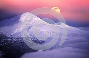 Moonrise among alpine peaks