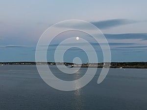 Moonrise. Bright sky in Portland, Maine.