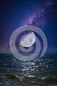 Moonset, moonrise over the ocean in the galaxy. Space dream image