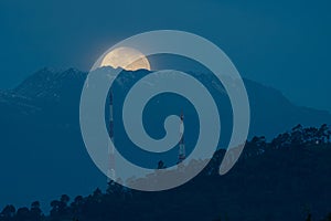 Moonset in a snowy mountain in Mexico. photo