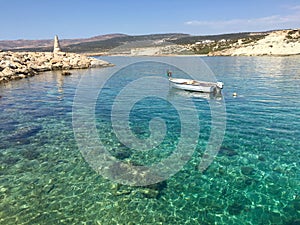 Moored boat in crystal water