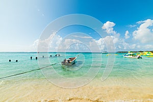 Moored boat in Sainte Anne beach in Guadeloupe island